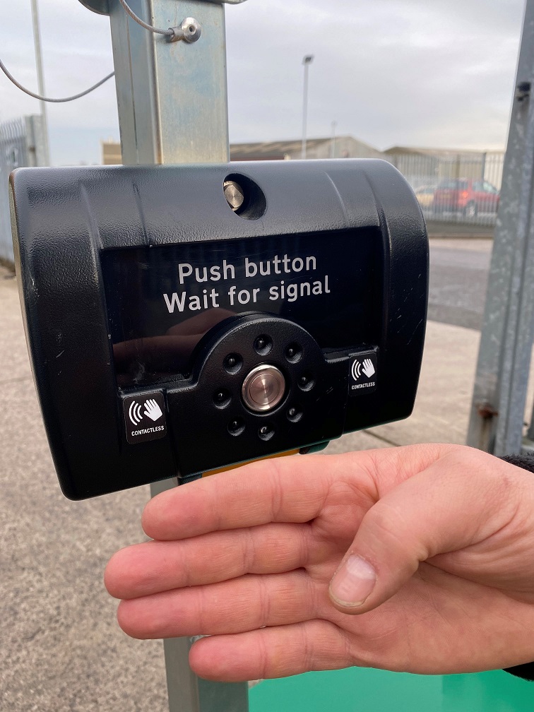 SRL says pedestrians are alerted to the contactless option by a sign on the stainless steel touch button (Credit – SRL)