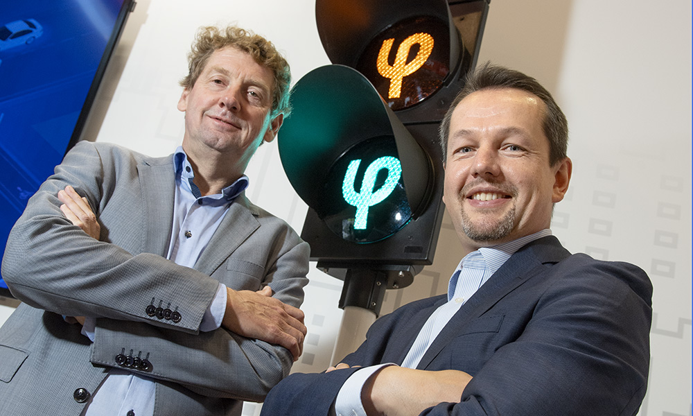 Jan Vos of Dynniq (left) and Michael Schuch of Swarco