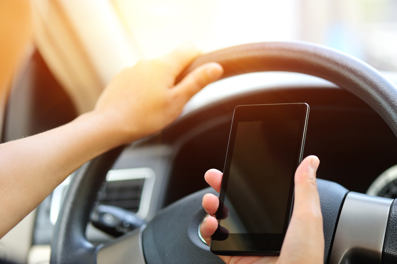 Distracted driving Covid speeding road safety © lzf | Dreamstime.com