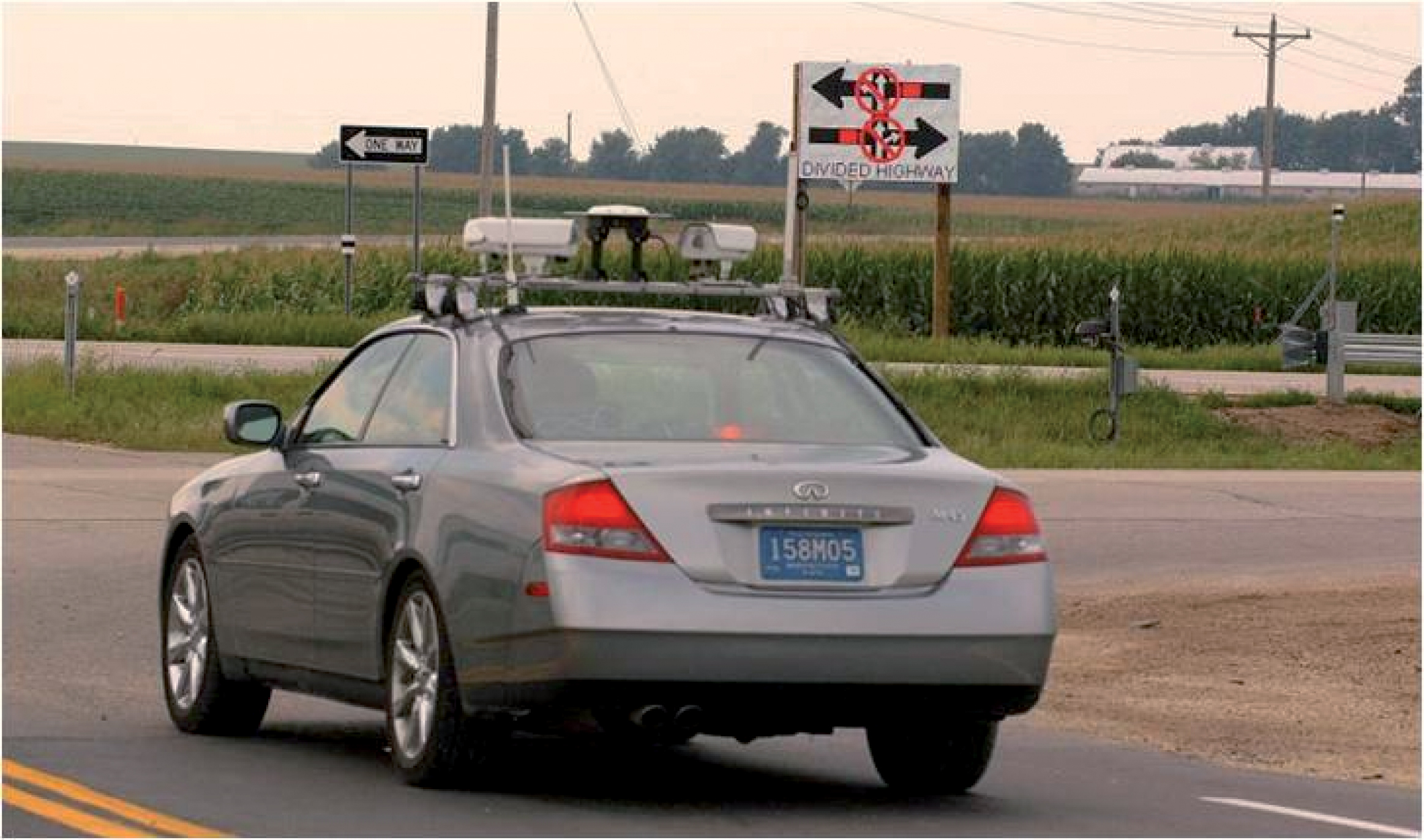 A Stop Sign Assist (SSA)-equipped car at a test intersection. (Courtesy of the ITS Institute, University of Minnesota)
