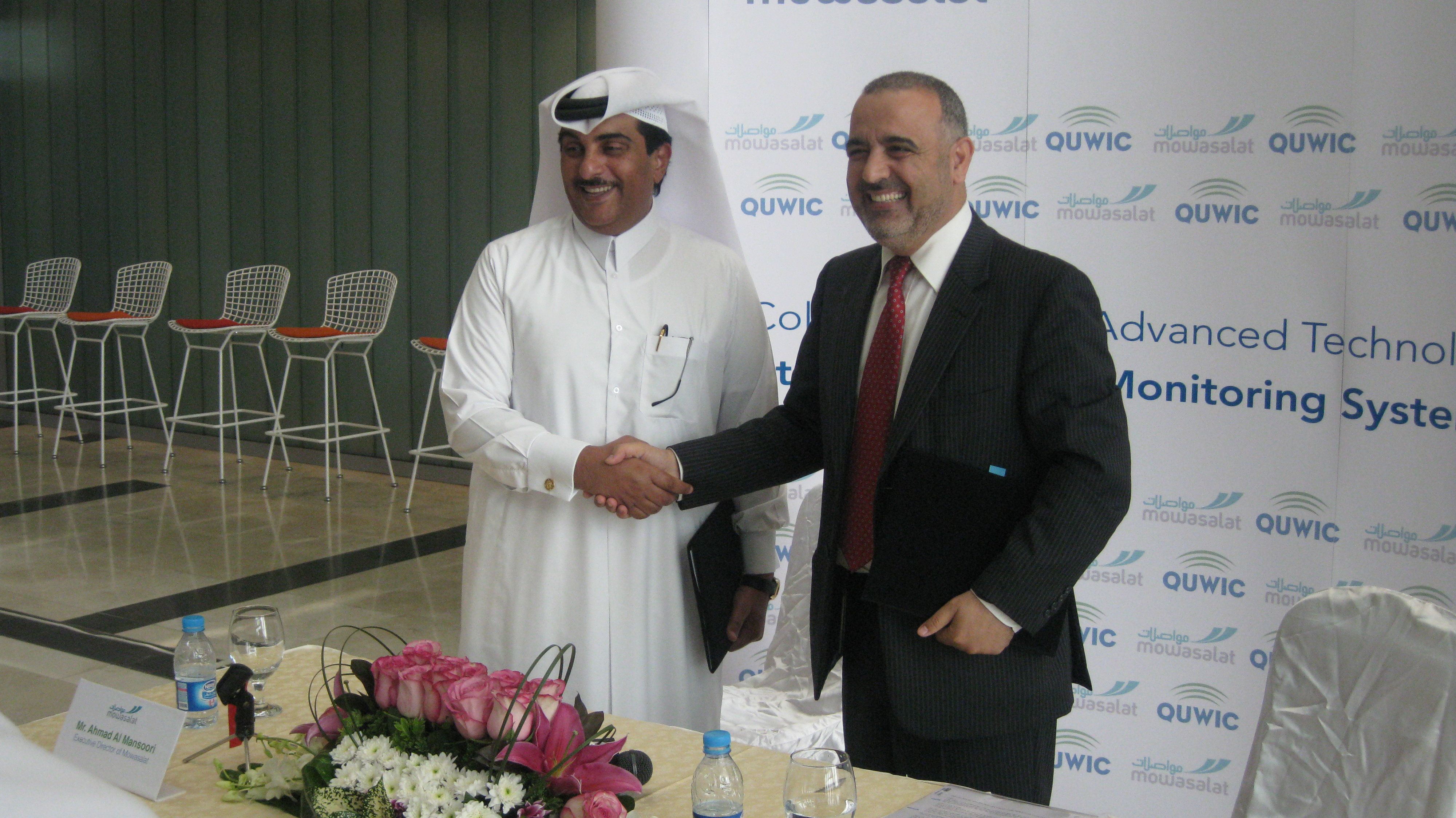 Dr. Adnan Abu-Dayya, executive director, QUWIC, and Ahmed Al Mansoori, executive director, Mowasalat, at the MoU signing ceremony