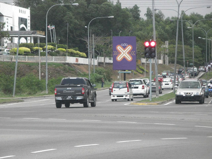 Cross sign on road