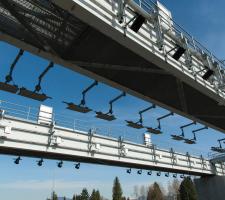 Twin gantries carry an array of surveillance and tolling equipment