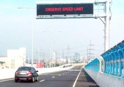 Toll road variable messaging real-time data road safety (image: NLEX)