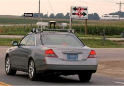 A Stop Sign Assist (SSA)-equipped car at a test intersection. (Courtesy of the ITS Institute, University of Minnesota)