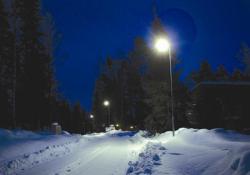 Dark snow covered road